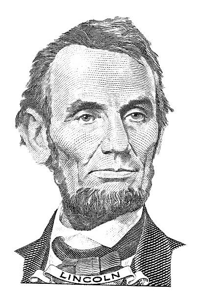 Portrait of Abraham Lincoln in front of the five dollar bill
